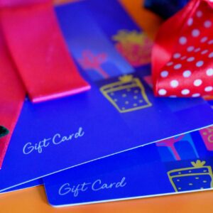 Detailed close-up view of Valentine's Day and Christmas gift cards.